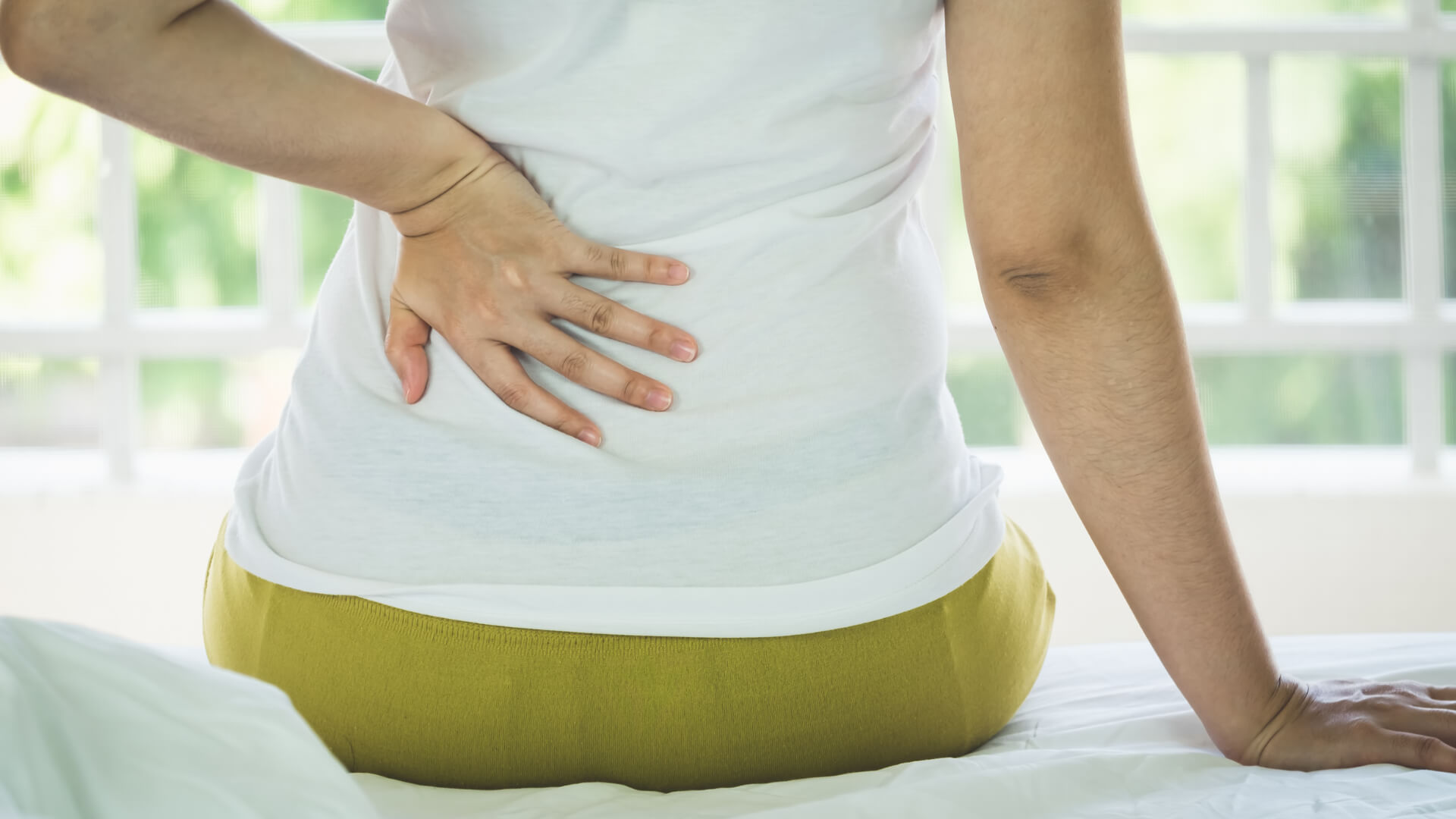 Woman with Backache Image